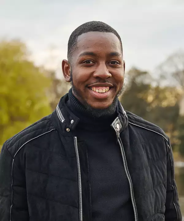 A portrait of Neighbourhood Organiser Akeim Mundell BEM