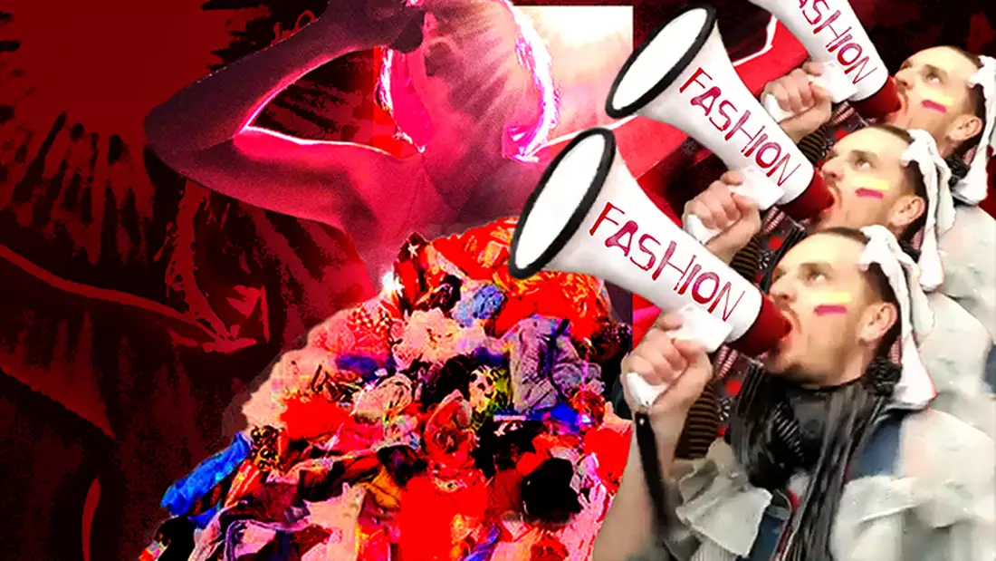 man shouting into a megaphone which reads 'Rebels of Exintion'