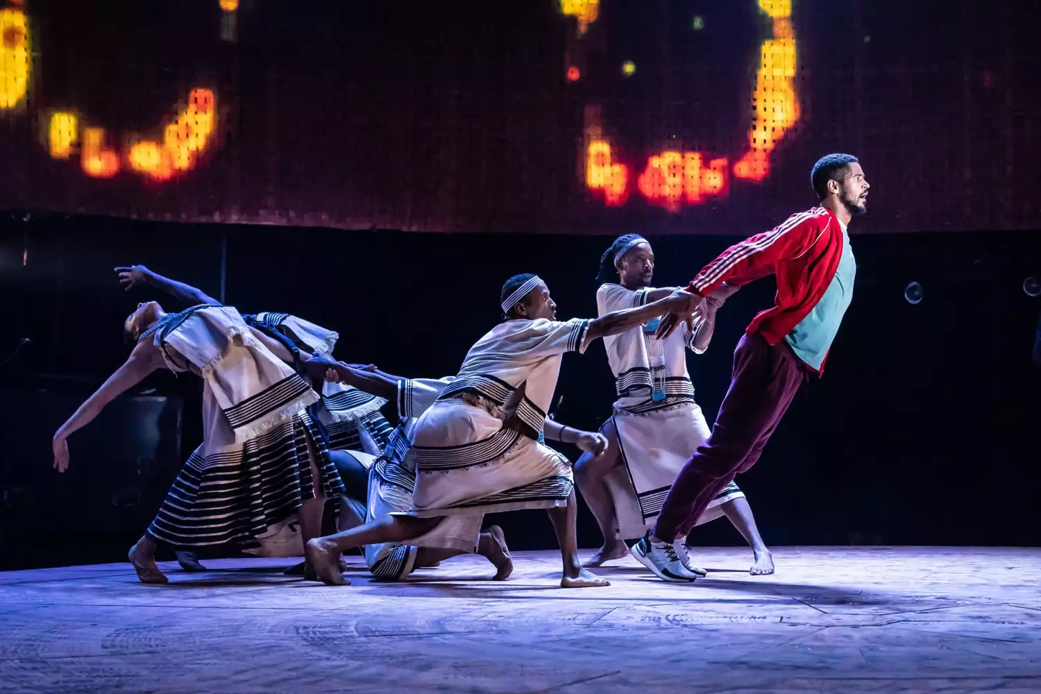 Cast members during a performance of Tree of Codes at MIF15